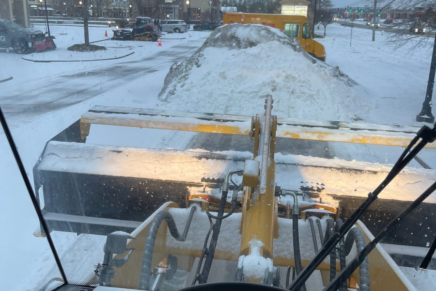 Snow removal operation from the perspective of a vehicle equipped with a snowplow